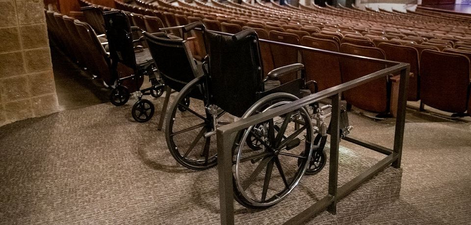 ADA wheelchair seats at an indoor venue