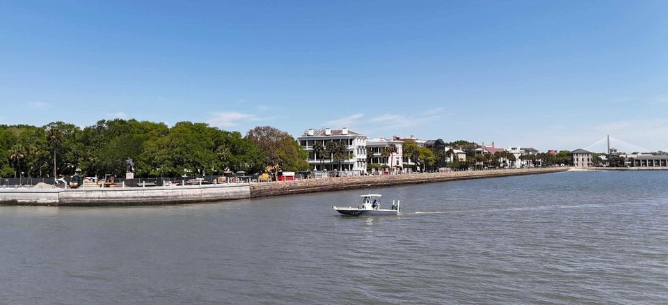 Fishing boat cruising near Ravenel Bridge in Charleston