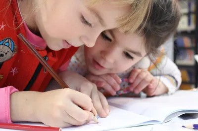 Two kids in a classroom