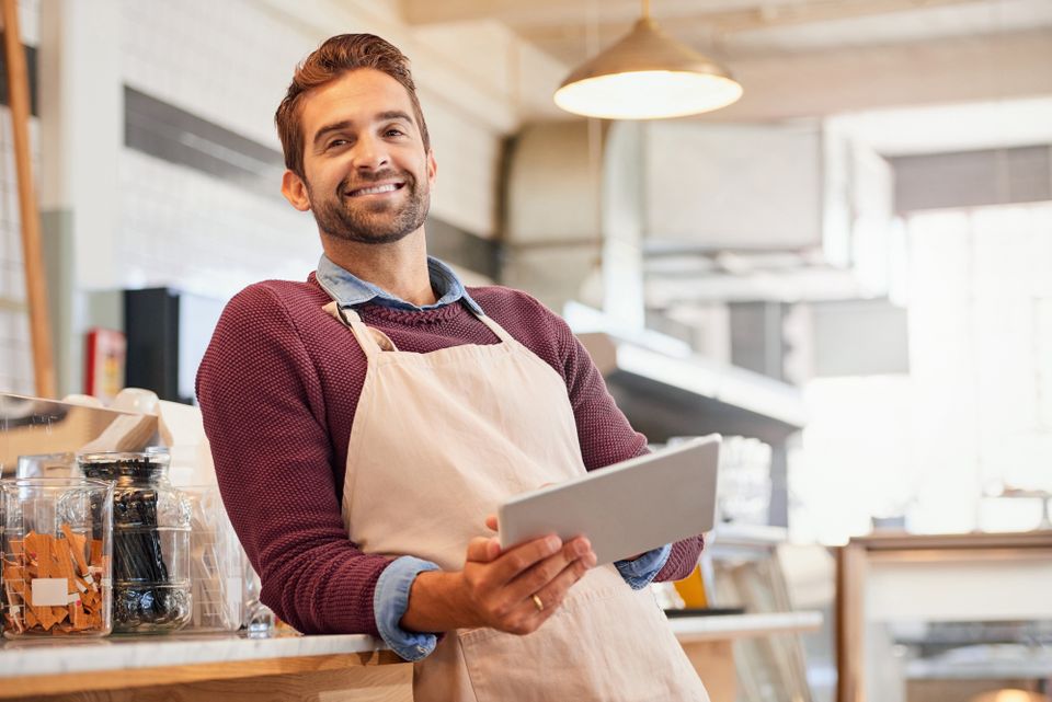 Happy business owner flip