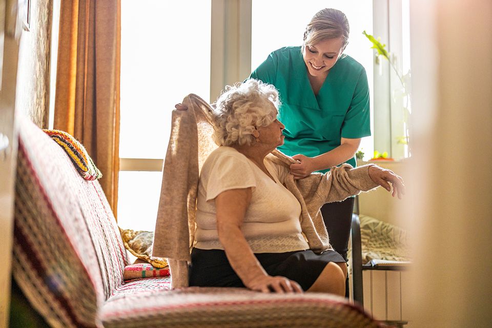 Bigstock female nurse taking care of a 412940281 home health care