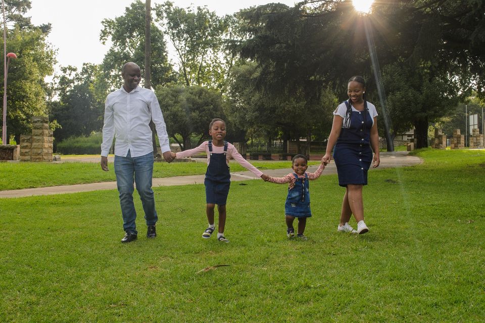 Happy family with two little homeschooled girls in Houston, Texas