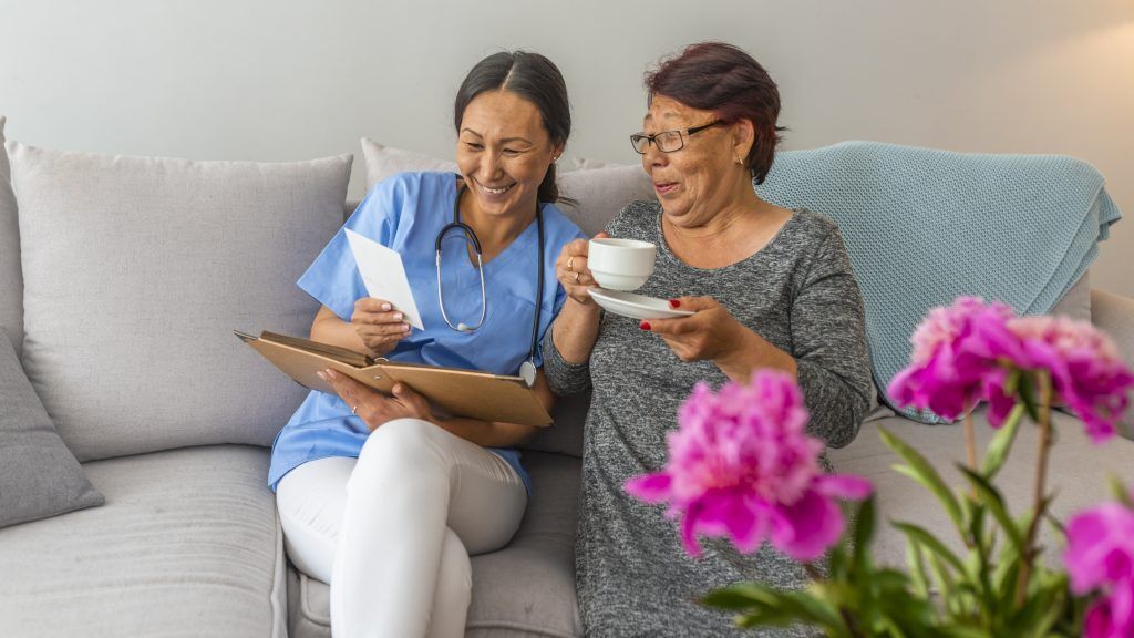 Professional caregiver providing compassionate in-home support