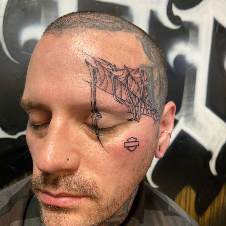 Detailed Face Tattoo in B&W