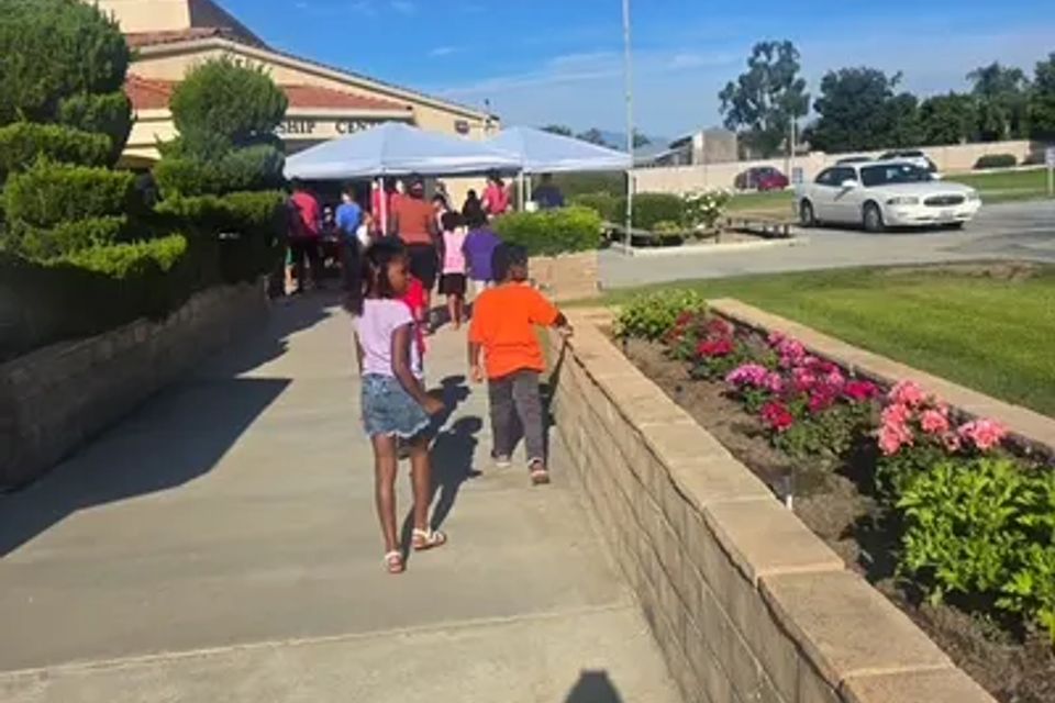 Children walking to a museum as a group with childcare  chaprones