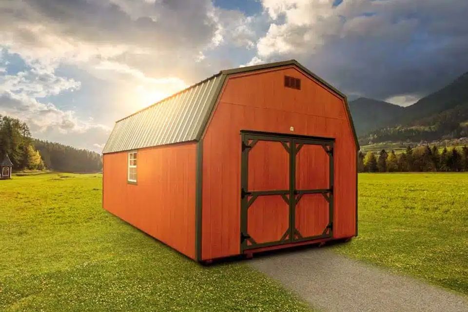 Orange high wall barn shed with double barn doors and metal roof in East Tennessee