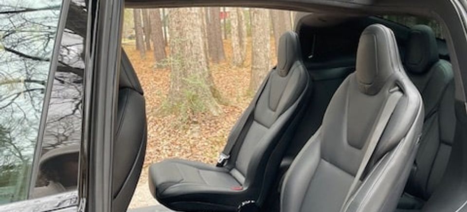 Abner shotwell tesla   back wing doors open min
