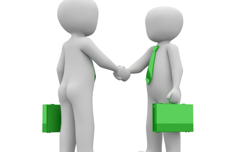 Robots shaking hands
