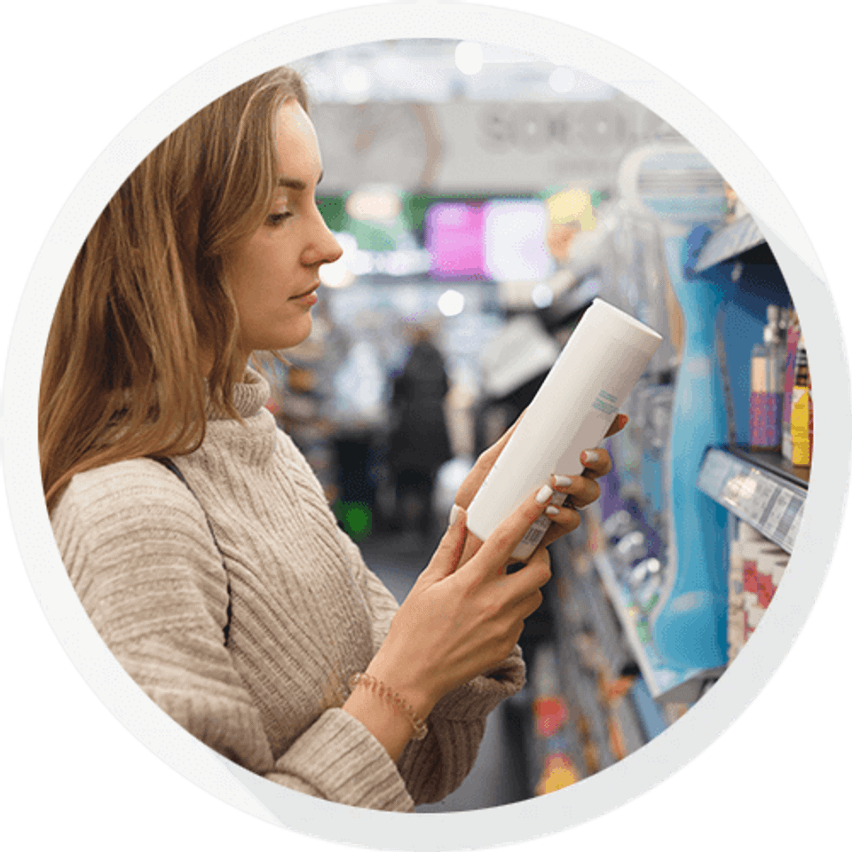 Woman browsing products in convenience store