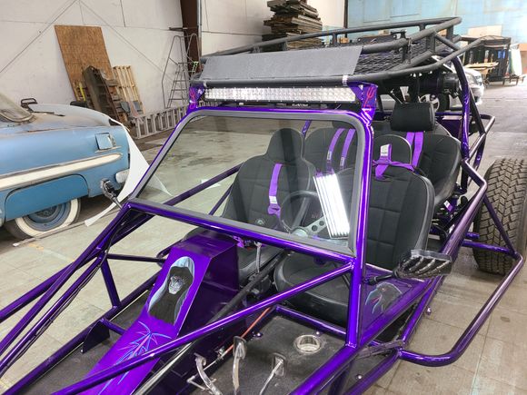 Close-up of a custom off-road vehicle featuring a professionally fitted custom windshield and glass installation.
