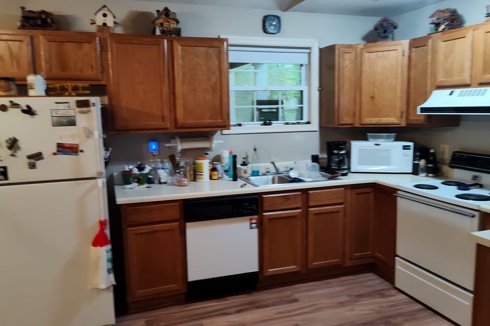 Finished kitchen re face  installing floating floor with base shoe in kitchen tj 1