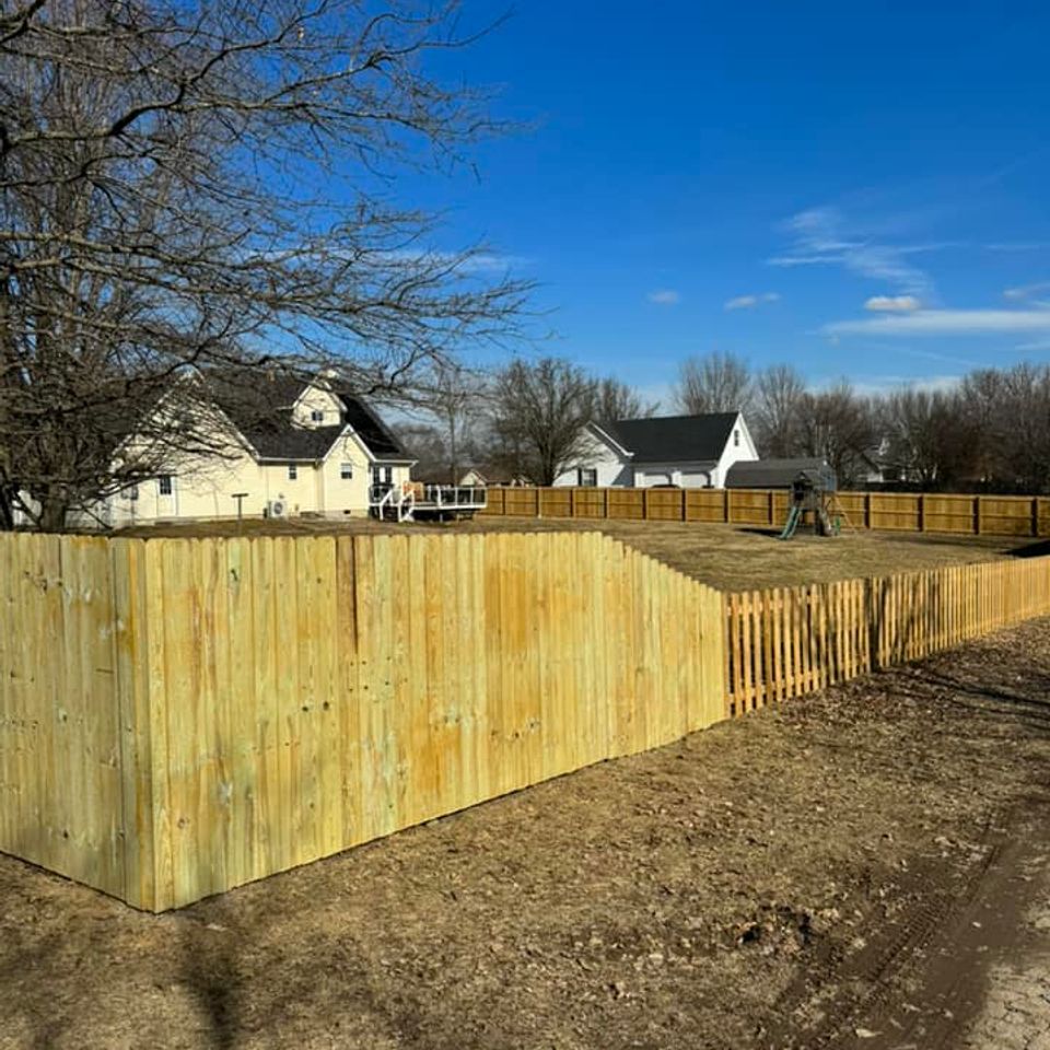 custom transitioning wooden fence different heights