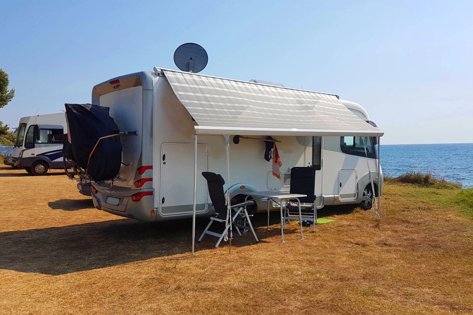 Motorhome parked by the sea with awning out during camper companion services on Long Island NY