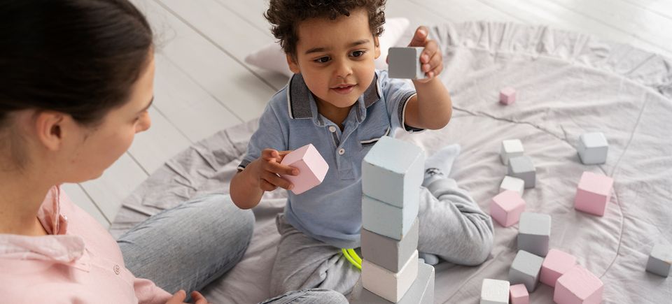 Close up child enjoying didactic game
