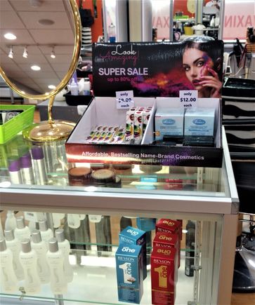 Here is a hair salon. This display is featuring makeup, cosmetics, skincare, personal care, health and beauty products and more