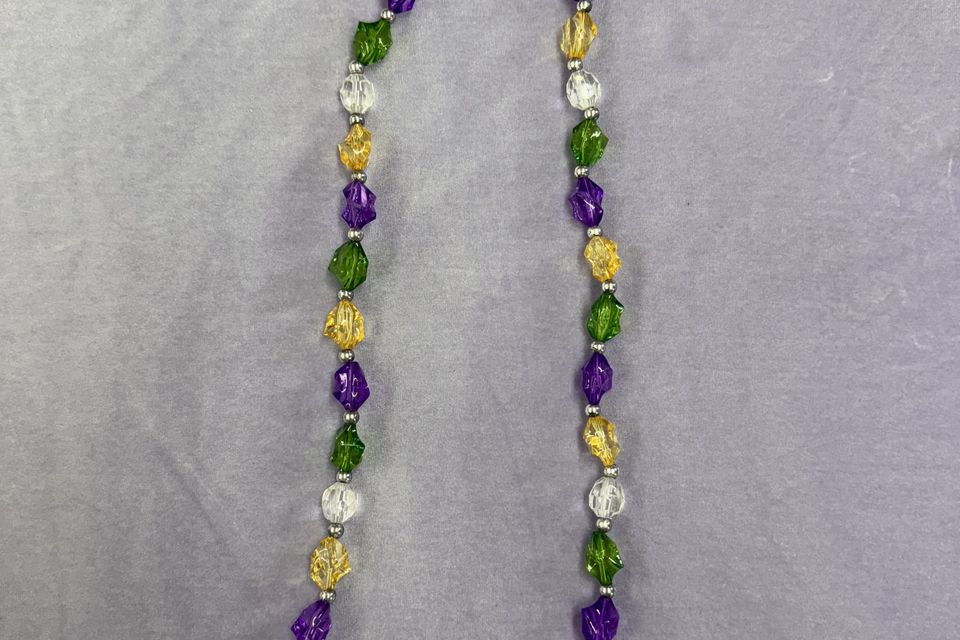 Purple, green, gold and white gem stone beads