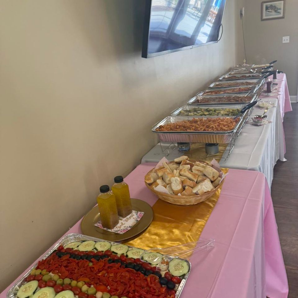 alt="The Party Savers staff bartending and waitressing at a Long Island Christening Party"