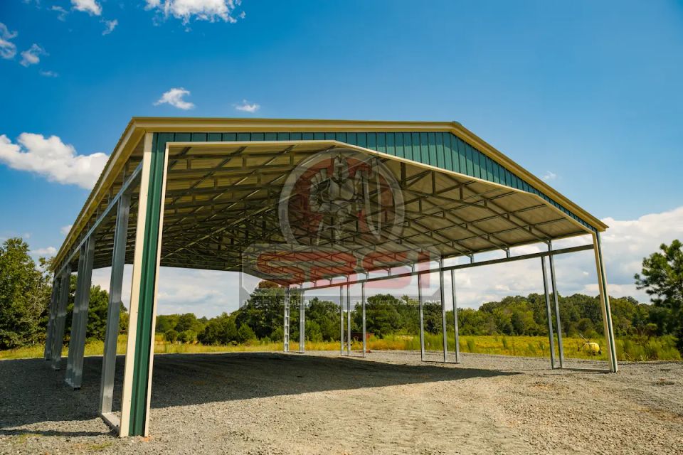 Green and tan steel carport with open sides in rural field with SBSI watermark representing steel carports in Alabama
