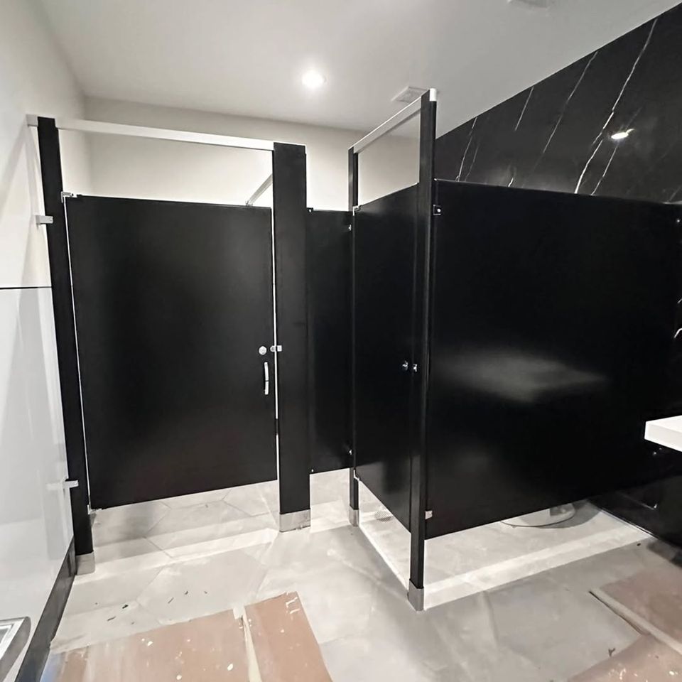 Black bathroom partitions done by Pabst Leyton in Southern California