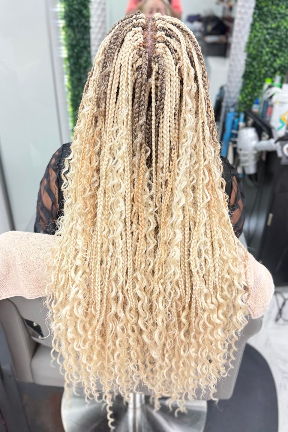 woman with blond braid extensions