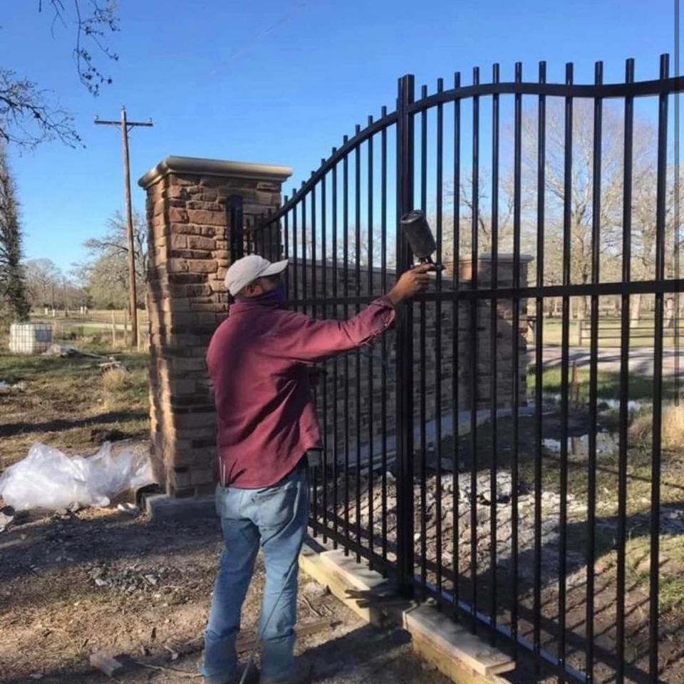 Painting black iron driveway gate