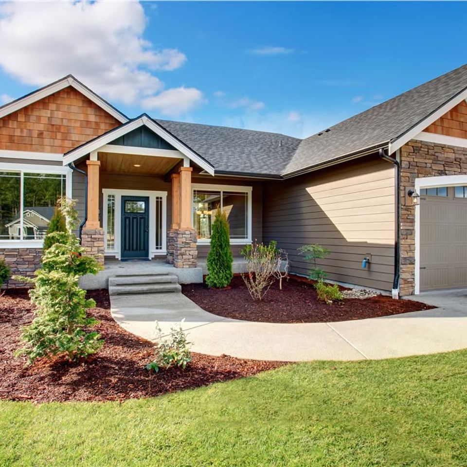 Craftsman home stone entry landscaping