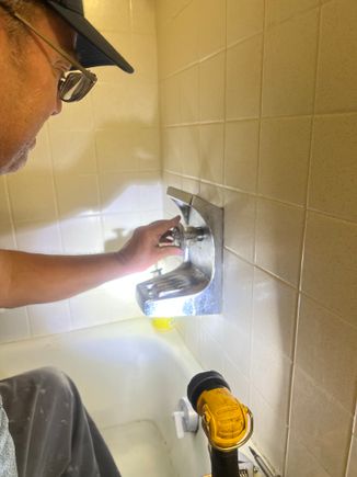 Kenny working on a tub repair