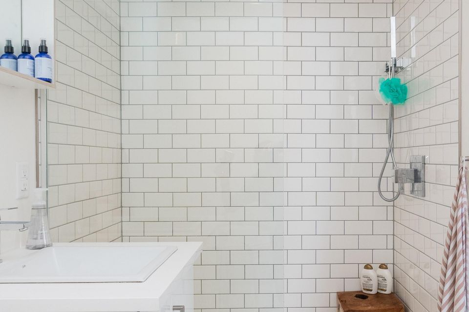 shower floor tile, wall tile and bathroom vanity