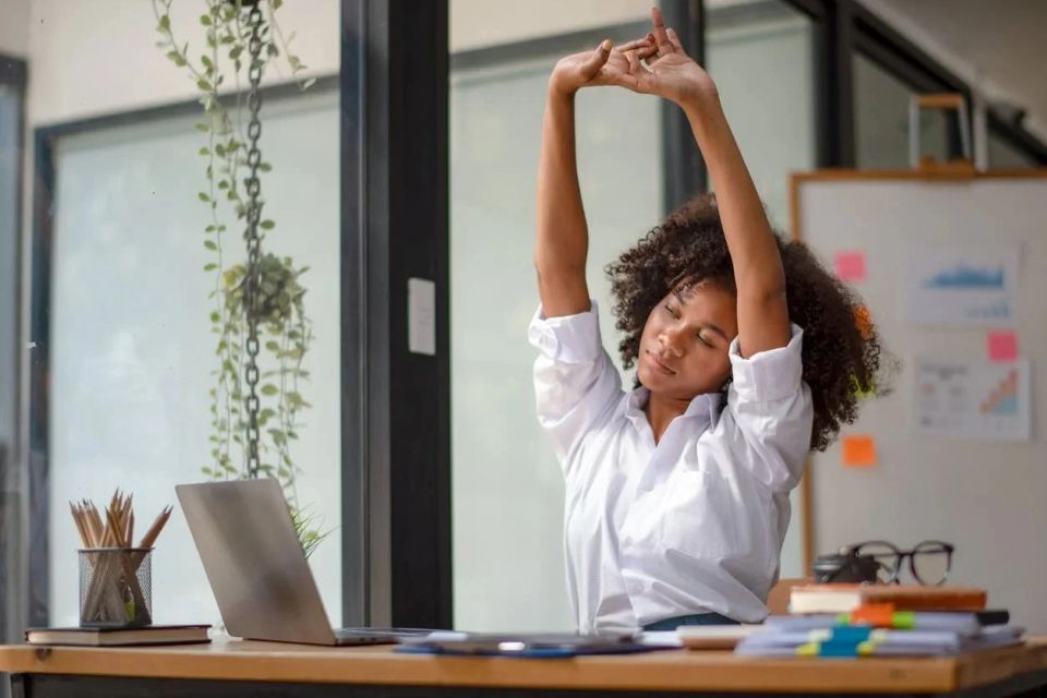 Desk yoga  7 stretches to relieve work related tension
