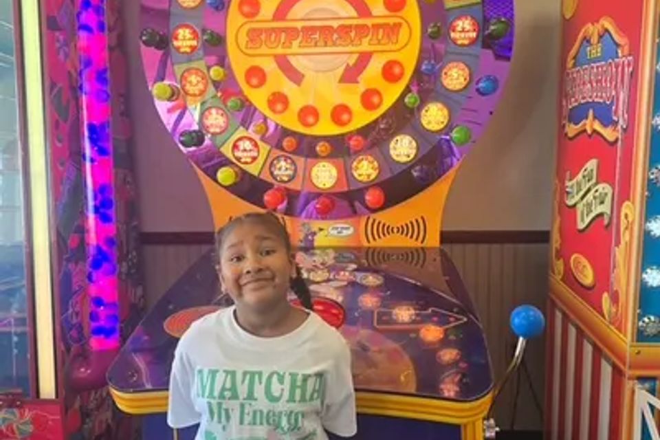 At Chuck E. Cheese, a child is playing the Big Win Game.