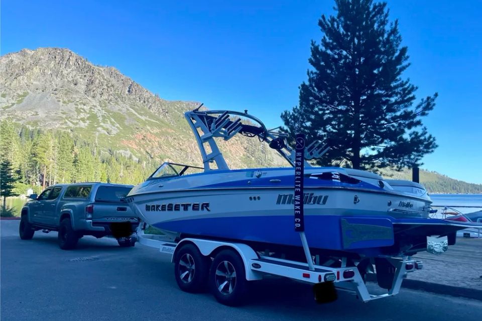 KPCopy's truck hooked up to their Malibu Wakesetter at Fallen Leaf Lake 