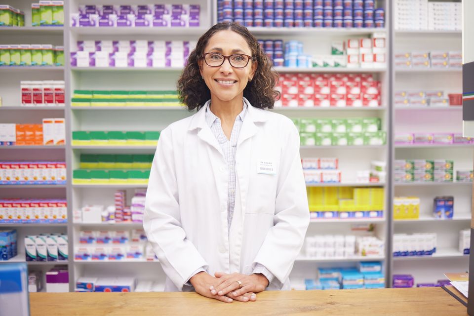 Pharmacy pills and portrait of a woman pharmacist 2023 11 27 05 23 22 utc