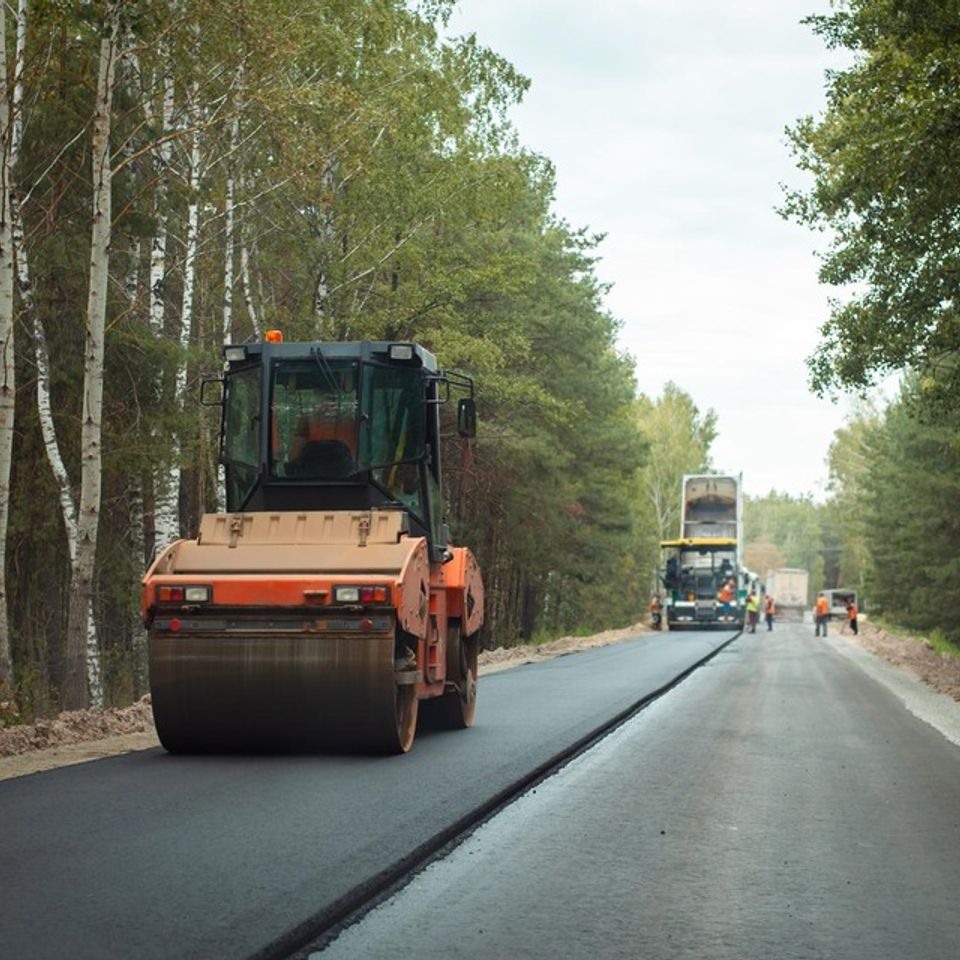Asphalt contractor maintaining a road