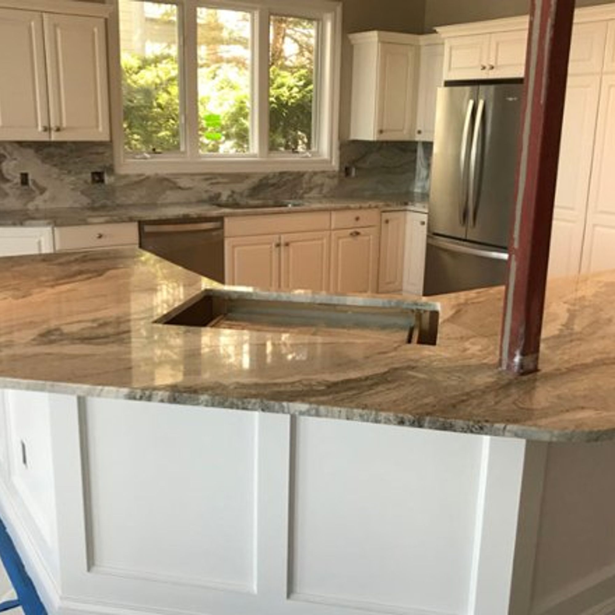 Traditional Kitchen Remodel by TJ Marble & Granite of Northern Michigan — Project 1 project photo