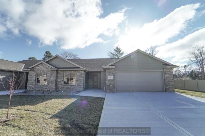 Beautiful Townhome located in quiet Cul-de-Sac with Open Concept, Spacious Master Suite, and Inviting Patio in Grand Island, Nebraska.