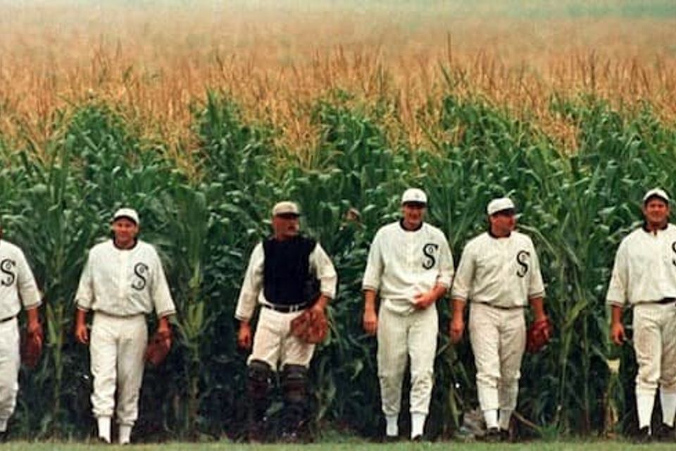 Field of Dreams crew emerging from the corn fields 