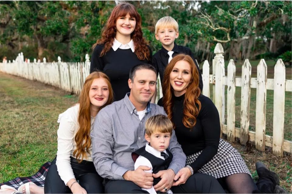 Family-owned Neighborhood Golf Carts business owners with their children in Madisonville, LA