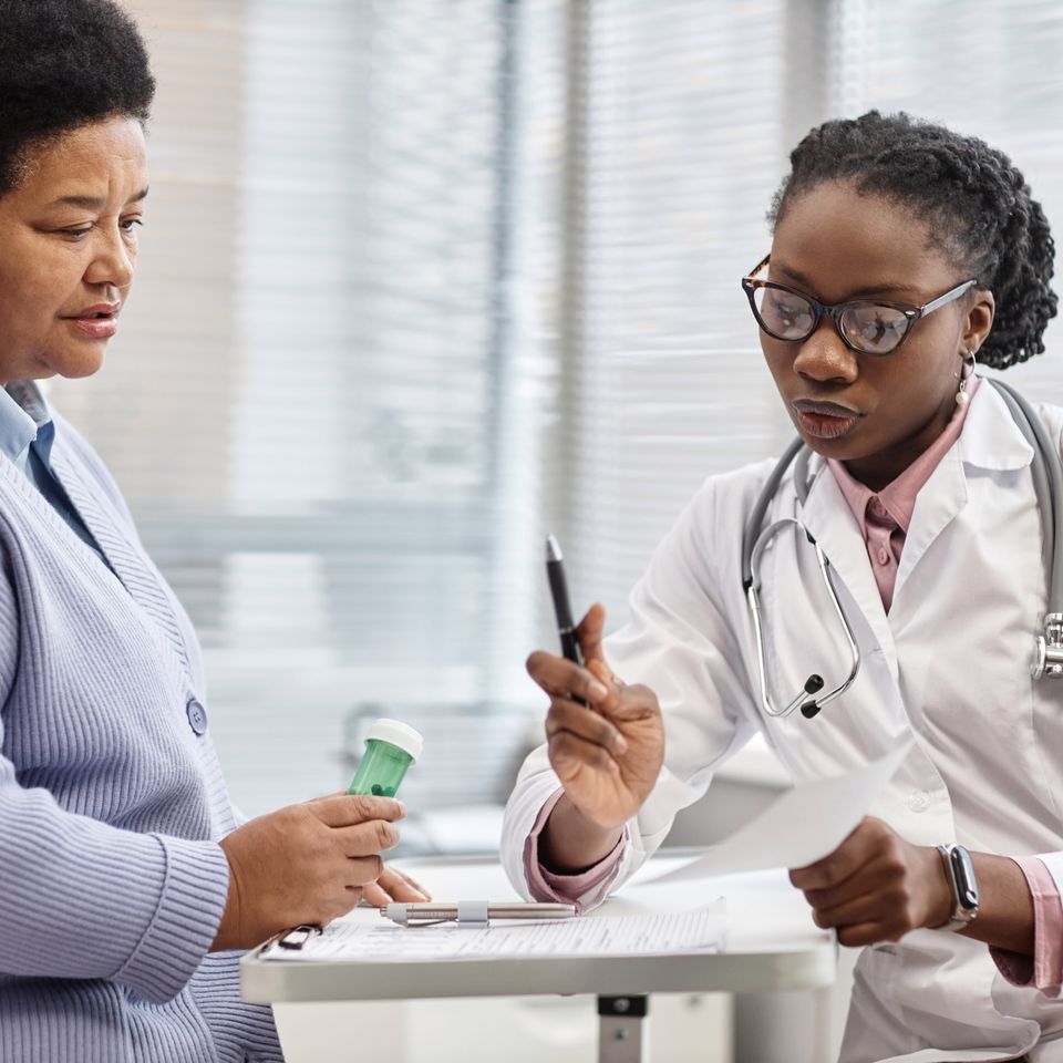 Doctor showing prescription to female patient 2024 01 19 18 25 27 utc (1)