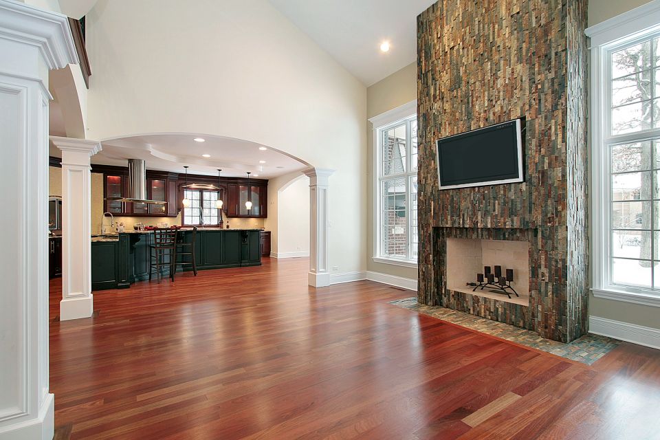 Living room in new construction home with fireplace