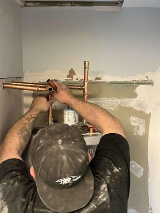 Chris intalling a water heater