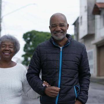 Older mother adult son relationship hands together walking street 804687 1227