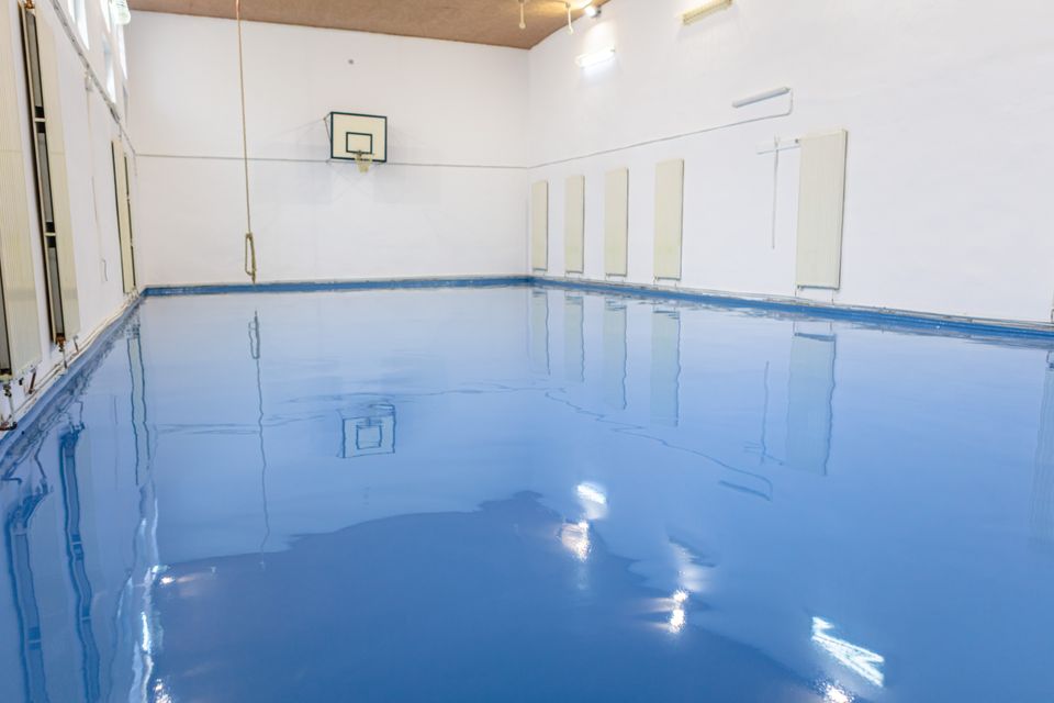 Blue epoxy floor in the gym