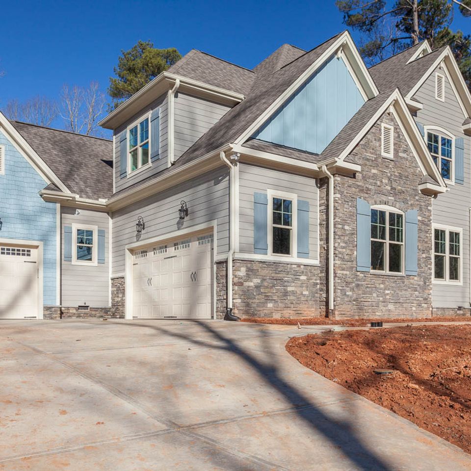 7601 front elev shakes stone matching gutters