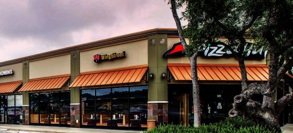 Batchelder construction inc wing street pizza hut strip mall