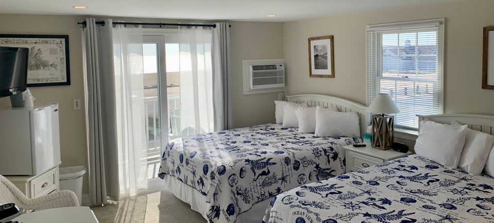 Martha’s Vineyard room with two queen beds and ocean view balcony