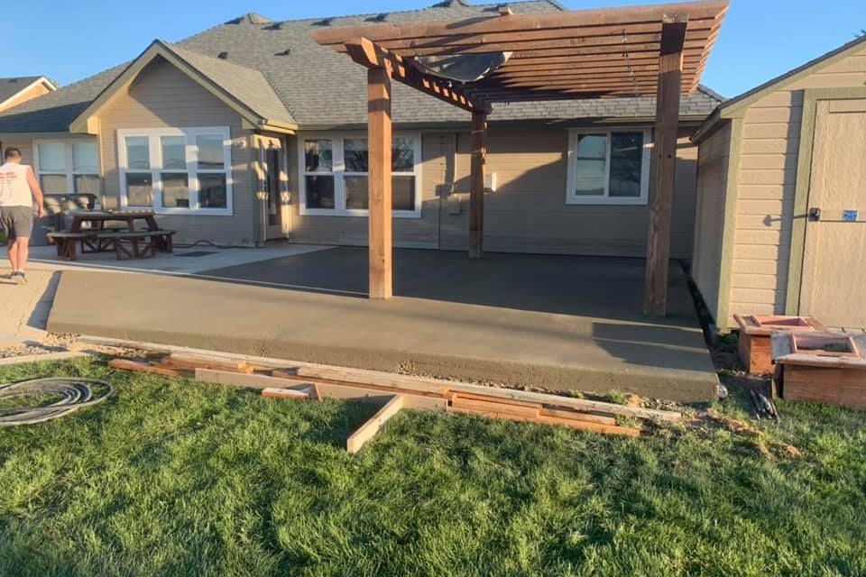Striping forms after pouring extension | Platinum Concrete Construction Idaho