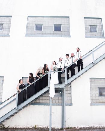 Wedding party on outside staircase