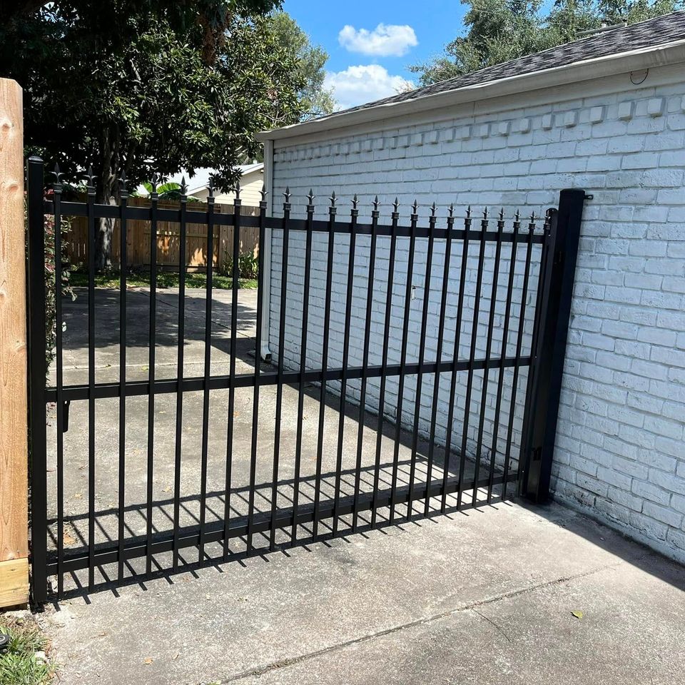 Black iron sliding gate designed by Marquez Welding Houston