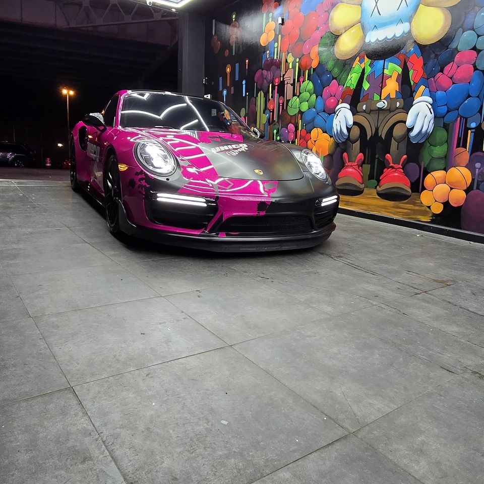 Professionally partial pink wrap for black vehicle