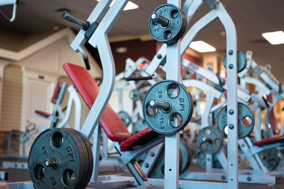 A premium shoulder press machine at Maximus Gym in Riverhead